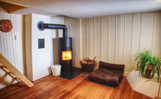 Lounge in front of the guestroom with stairs to meditation hall