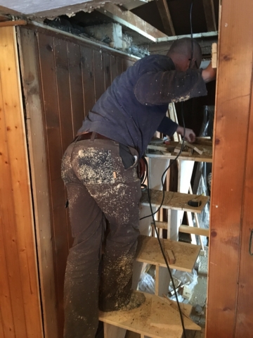 Early days: Building a staircase into the attic to build a meditation hall